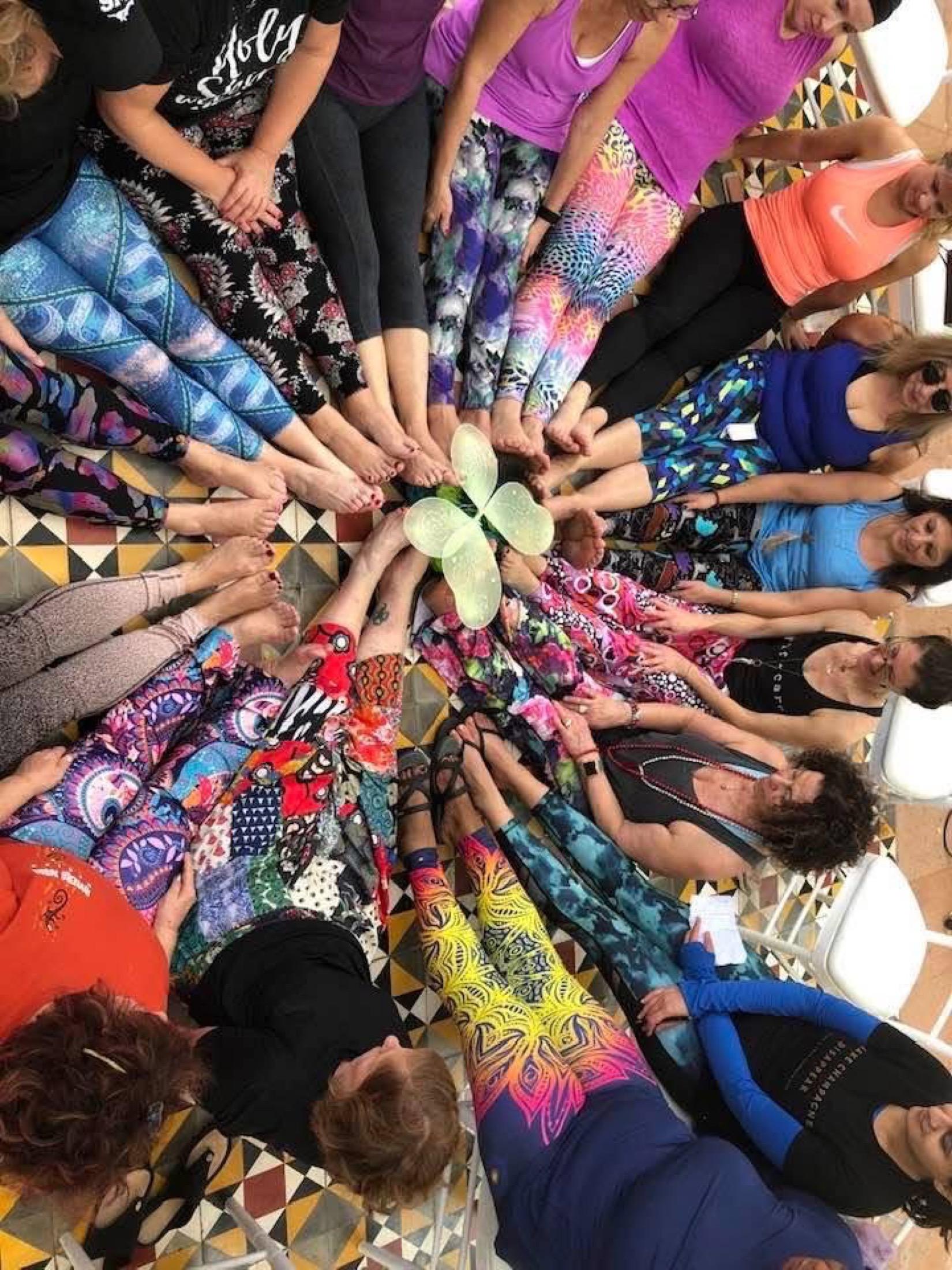 Soul-O women travelers forming a colorful community circle